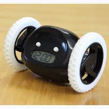 These motorized 'clocky' and 'tocky' alarm clocks from 'nanda home' run away (well, more like roll away) from you after they go off, forcing you to get out of bed and chase them down if you want to turn them off. Running Clocky Runaway Alarm Clock With Moving Wheels Fun Novelty Gift Sleeper Kids Alarm Clock Clock For Kids Alarm Clock