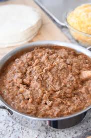 Place a burrito on a work surface. My Mom S Famous Freezer Beef And Bean Burritos Mel S Kitchen Cafe