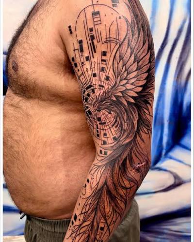 Phoenix Full Arm Tattoo 🔥 Rising from the ashes—stronger, fearless, reborn. This full arm Phoenix tattoo represents transformation, resilience, and the power to begin again. Every feather tells a story of struggle