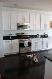 If your kitchen uses natural wood cabinets or trim, light colors like cream or white will be a compliment. Black And White Kitchen Floor Tile Layjao