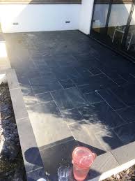 Use a chisel to remove the problem bricks. Removing Cement Smears From A Black Slate Patio In Brentford Stone Cleaning And Polishing Tips For Slate Floors