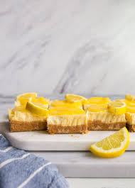 Lemon Cheesecake Bars With Homemade Lemon Curd Cheesecake Lemon Bars Are A Fun Easy Summer Dessert Lemon Cheesecake Bars Lemon Cheesecake Cheesecake Bars