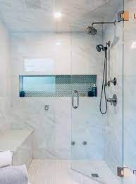 Bathroom shower remodel on a budget. 25 Shower Base With Bench For Modern Bathroom Ideas Modern Bathroom Remodel Bathroom Remodel Shower Restroom Remodel