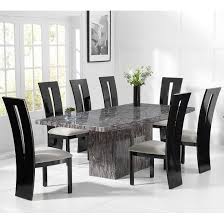 The dining table is where you will share food, conversations and laughter, particularly during holidays. Kempton Marble Dining Table In Grey With 6 Ophelia Grey Chairs Furniture In Fashion
