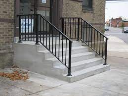 Gorgeous black wrought iron railing for a chic entrance look. Wrought Iron Black Brown Wrought Iron Stair Railing Wrought Iron Railing Exterior Outdoor Stair Railing