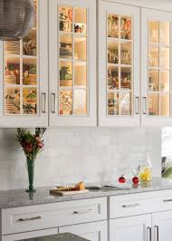 white kitchen cabinets with wallpaper