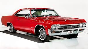 Image result for Regal Red 1965 Chevy II
