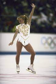 The Most Epic Olympic Ice Skating Costumes Of All Time Figure Skating Outfits Ice Skating Costumes Olympic Ice Skating