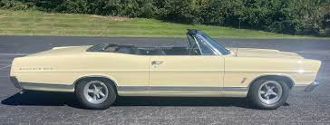 Image result for Canary Yellow 1967 AC Cars