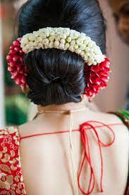 Indian Bridal Hairstyles Dahlia And Gajra Bridal Hairstyle For The Wedding Wedmego Indian Bridal Hairstyles Bridal Hairstyle For Reception Bridal Hair Buns