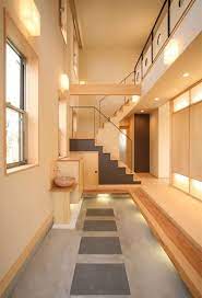 東京都内の吹抜け玄関がある和モダンの家 東京 神奈川の注文住宅 ミニマリストベッドルームのアイデア ミニマリストホーム デザイナー
