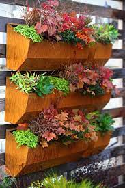 Imagine tiny pansies, daisies, geraniums, and petunias painting your walls with delicate summer shades. The Leo Wall Planter I Can T Wait To Plant This Container Finegardening