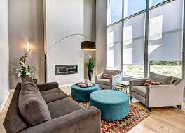 Virtually all ottomans are padded with foam at the top, so they don't have a flat surface. 24 Splendid Examples Of Circular Ottoman Coffee Tables In The Living Room Home Design Lover