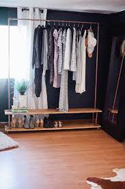 Measure and mark 8″ up from the bottom of your four dowels, but you will want to make sure that this mark is 90 degrees from the top hole. Clothing Rack Google Search Diy Clothes Rack Industrial Clothing Rack Diy Closet Storage