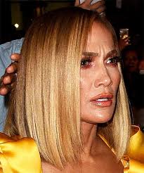 Messy face framing blonde bob. Jennifer Lopez Medium Straight Blonde Bob Haircut With Blunt Cut Bangs And Dark Blonde Highlights