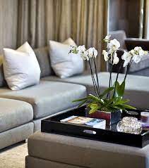 Whether you have a coffee table or an ottoman, i generally have the same tricks when styling them. Genius Coffee Table Ideas To Copy 8 Ottoman Decor Home Decor Decorating Coffee Tables