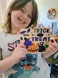 Carefree and neutral baby mobile with greenery