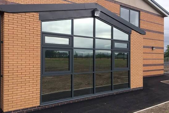 Grey Reflective Glass Brick Building Window