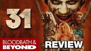 His latest is 31 where clowns and malcolm mcdowell trap dirty people in a warehouse and try to have hicks kill them. Rob Zombie S 31 2016 Movie Review Youtube