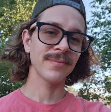 Does the process of AI art generation share similarities with photography?