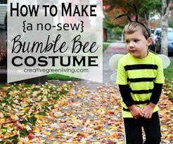 The easiest way to do the stripes is to put them on when your kiddo is actually in the bag. Bumble Bee Costume Tutorial Inexpensive No Sew Creative Green Living