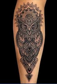 Black inked tribal shape flying owl tattoo design on back for men. Super Tattoo Femininas Braco Perna 15 Ideas Leg Tattoos Sleeve Tattoos Tattoos