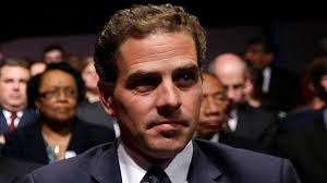 Hunter biden, right, attends a basketball game with his father, vice president joe biden, center, and. Jd5bhvtvp Uigm