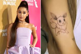Positions singer's flower, butterfly & latest inks. Ariana Grande Just Got A Giant Pokemon Tattoo On Her Arm