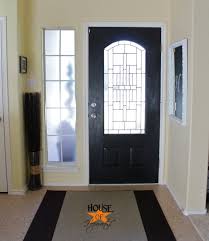 The one above is a good example of a normal 6 paneled door painted black inside the front doors and painted black stair railing adds an extra wow factor in this pretty foyer. Black Painted Front Door And It Wasn T An Epic Fail House Of Hepworths