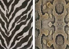 The porcelain floor and wall tile in ocre feature a variety of printed and raised leaves on a textured surface. Imagine Tile Kitchen Bath Business