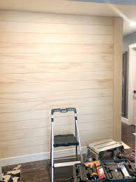 Cut lines that are random look much better than a solid cut line going up the whole wall. Affordable Diy Modern Shiplap Kristy By The Sea
