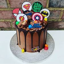 25657, 20703, 20704, 20697 shown on ¼ sheet cake. Marvel Cake Happie Returns