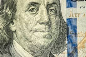 A close up of a dollar bill with the words " president "