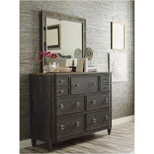 The finish is a beautiful rosewood color with veneer details in primavera, ebony, walnut burl, mahogany and cherry. 848 131 American Drew Furniture Ardennes Bedroom Dresser