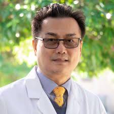 DR. QUANG TAM (TOM) LE