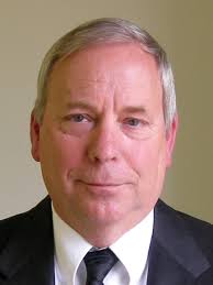 County leader didn't know his partner was involved in library deal