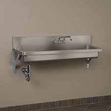 An undermount kitchen sink is installed under the counter, which creates a seamless look as there is not a rim from the sink that sits on the. Harlingen Six Jet Outdoor Shower Panel With Hand Shower Wall Mount Showers Outdoor Showers Outdoor Commercial Sink Steel Wall Sink