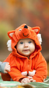 This collection presents the theme of cartoon wallpapers. Cute Babies Lying In Green Carpet Wearing Cartoon Dress 4k 5k Hd Cute Wallpapers Hd Wallpapers Id 33963