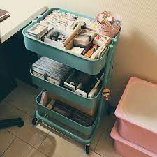 rc on instagram 大年初一得到了夢幻逸品ikea raskog 推車 儲存容量和用起來比原先以為的好用許多 新書桌整理的差不多了 organization suitcase luggage