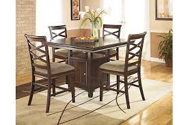 The Hayley Counter Height Dining Table From Ashley Furniture Homestore Afhs Com Dining Room Sets Counter Height Dining Room Tables Counter Height Dining Table