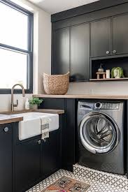 This setup is really nice if we are not able to stack the washer and dryer. Rich Black Cabinetry In Our Summit Creek Project Laundry Room Becki Owens