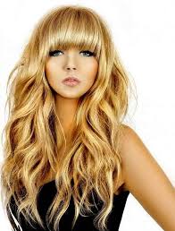Center parted medium length hairstyles with wispy bangs. Beach Waves Hairstyle With Bangs For Long Hair Hair Waves Beach Wave Hair Long Hair Styles