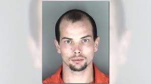 Explosive device found at home of double homicide suspect