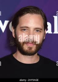 Aaron stanford red carpet hi-res stock photography and images