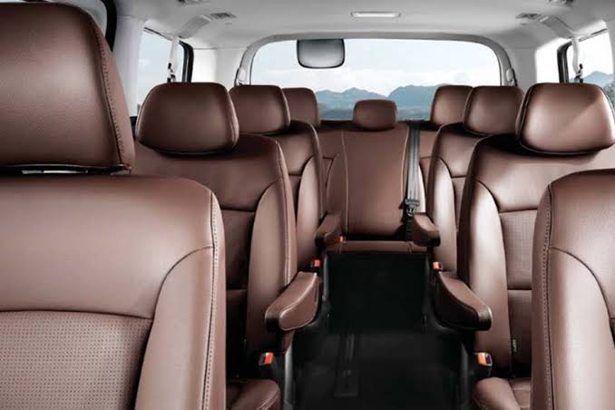 Multi-row cabin layout configured for 9 to 12 passengers, AI generated