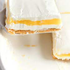Lemon Lasagna The Perfect Combination Of Sweet Tart And Creamy This Lemon Lasagna Is One Of Our In 2020 Lemon Dessert Recipes Lemon Lasagna Cookies Recipes Christmas