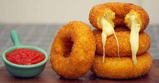 Dip onion rings in the batter, working in batches, until evenly coated and arrange in 1 layer on a plate. Cheesy Stuffed Mozzarella Onion Rings