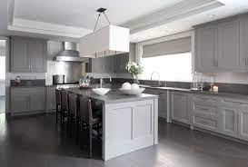 You can also go for a grey kitchen with a white kitchen island, countertops and a backsplash that will refresh it. Grey Kitchen With Dark Floors Novocom Top