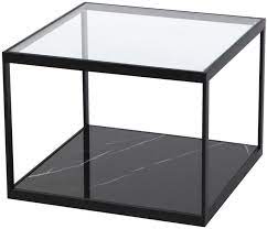 It flaunts a clear, tempered glass top and forged iron frame with subtle rings and curves finished in rustic bronze patina. Tamon Glass Coffee Table Black Frame With White Marble Base Coffee Tables