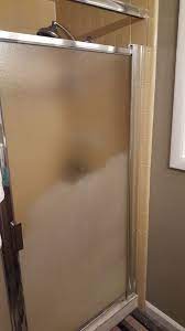 How To Clean Hard Water Spots Scrubbing Required Clean Shower Doors Hard Water Spots Shower Cleaner